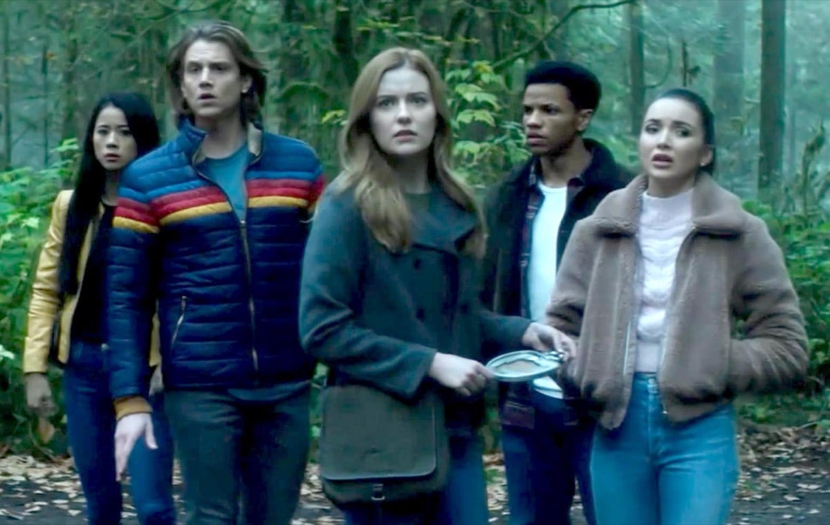 The Drew Crew standing in the woods on The CW's Nancy Drew.