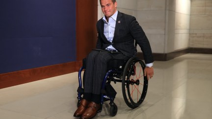 Madison Cawthorn in his wheelchair in a hallway of the Capitol