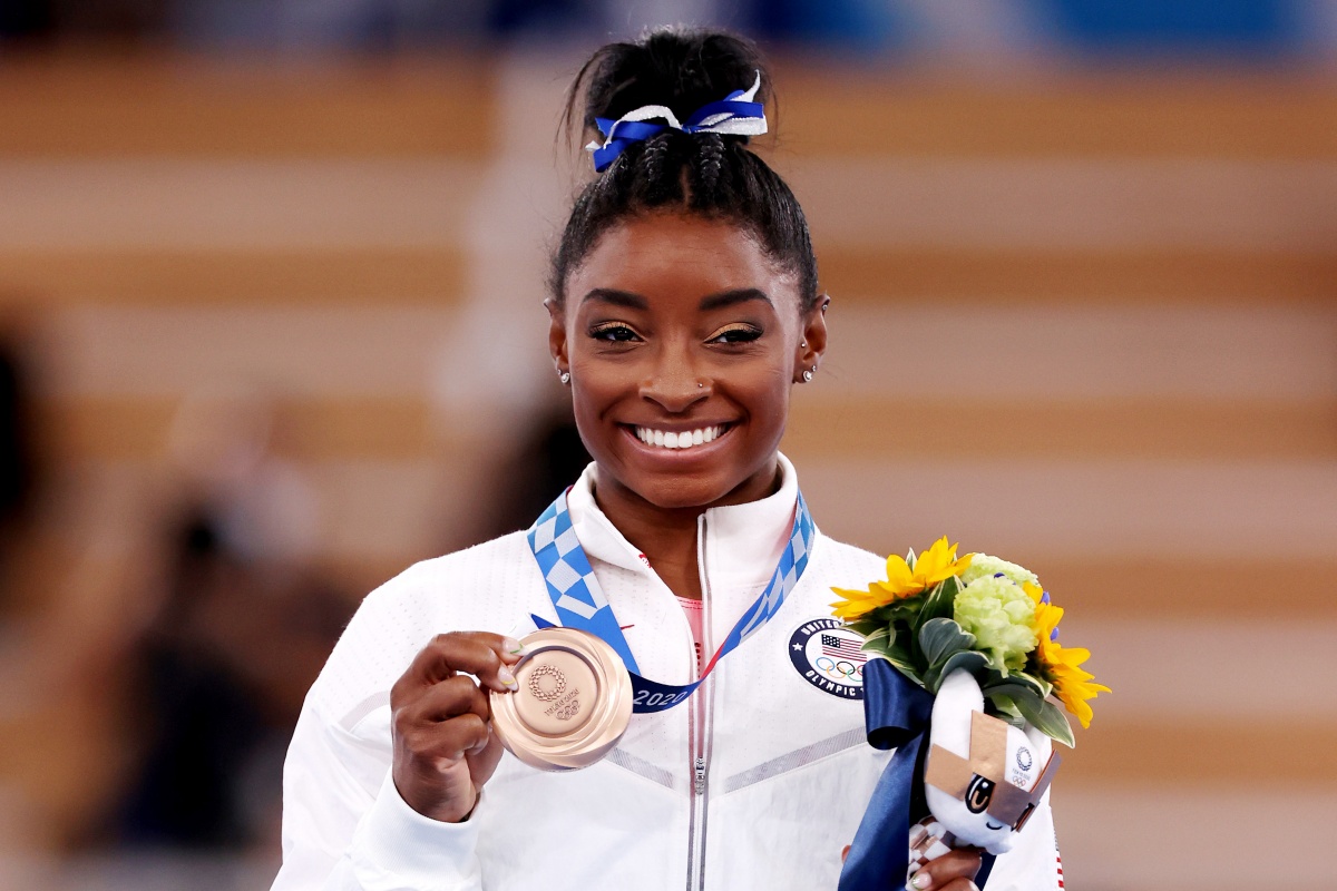 TOKYO, JAPAN - AUGUST 03: Simone Biles of Team United States poses with the bronze medal during the Women's Balance Beam Final medal ceremony on day eleven of the Tokyo 2020 Olympic Games at Ariake Gymnastics Centre on August 03, 2021 in Tokyo, Japan. (Photo by Jamie Squire/Getty Images)