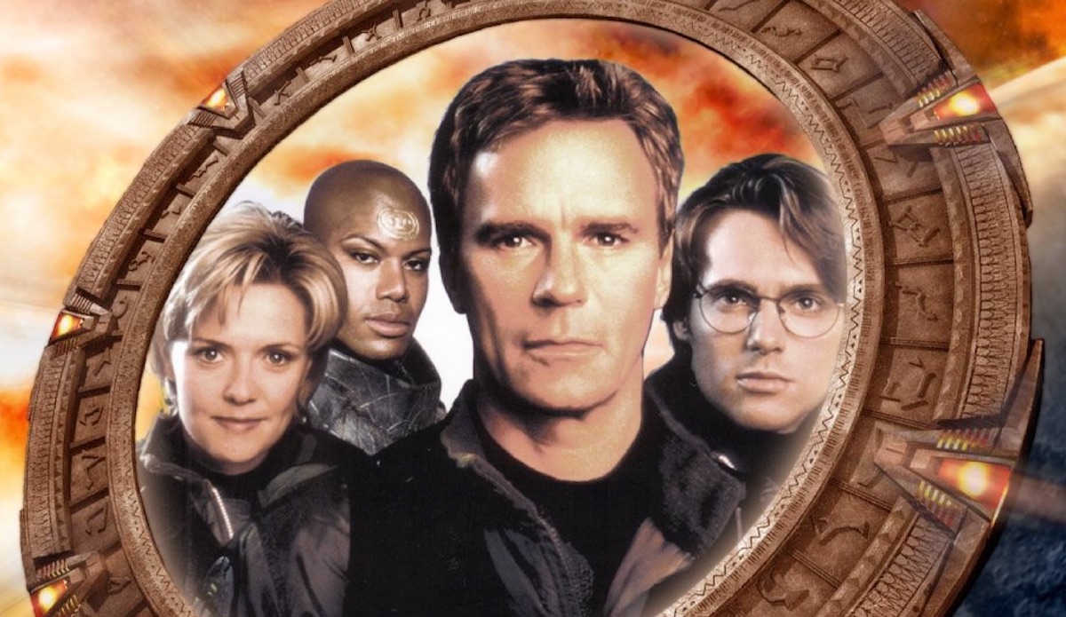 The main cast of Stargate SG-1 within an image of the Stargate