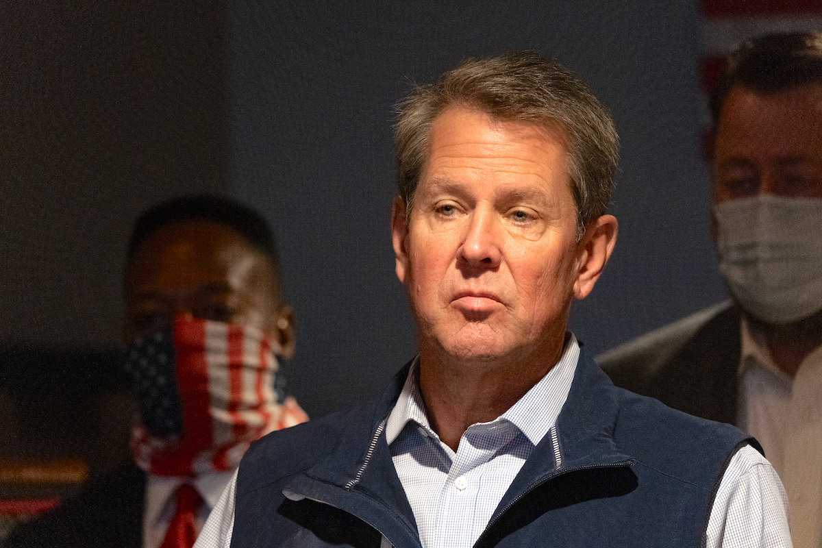 Brian Kemp speaks at a news conference
