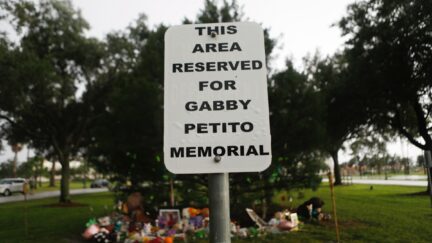 NORTH PORT, FLORIDA - SEPTEMBER 21: A makeshift memorial dedicated to Gabby Petito is located near the North Port City Hall on September 21, 2021 in North Port, Florida. The body of Petito was found by authorities in Wyoming, where she went missing while on a cross-country trip with her fiance, Brian Laundrie. Law enforcement agencies are for searching for his whereabouts. (Photo by Octavio Jones/Getty Images)