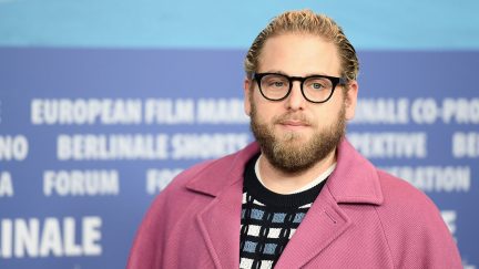 Jonah Hill in a pink jacket at a premiere