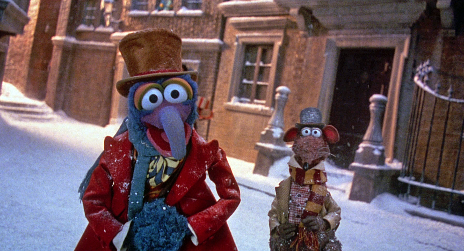 Gonzo and Rizzo walking in the snow in The Muppets Christmas Carol