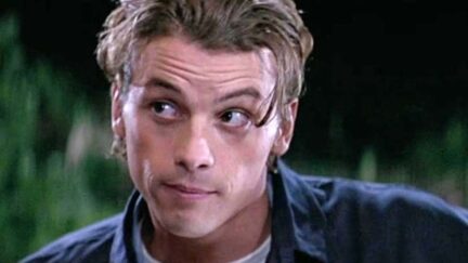 Skeet Ulrich smirks as Billy in a scene from Scream.