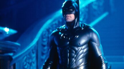George Clooney as Batman standing with his nipples out in Batman & Robin