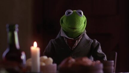 Kermit the Frog at a table in the Muppet Christmas Carol
