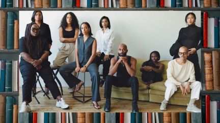 Solange Knowles, Shantel Pass, and other members of Saint Heron. Image over a photo of books. (Image: Rafael Rios.) https://www.essence.com/entertainment/only-essence/saint-heron-exclusive/