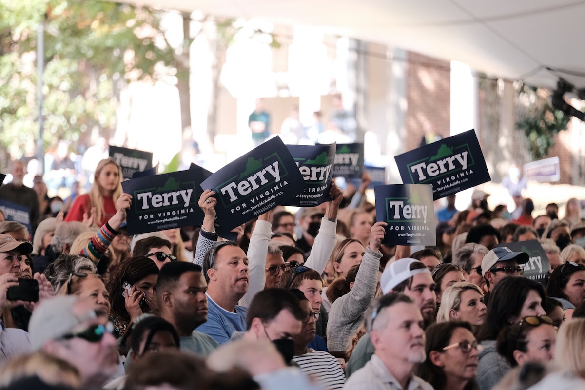 Supporters of Democratic gubernatorial candidate, former Virginia Gov. Terry McAuliffe attend a get-out-the-vote rally