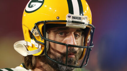 Aaron Rodgers looks sad in a football helmet.