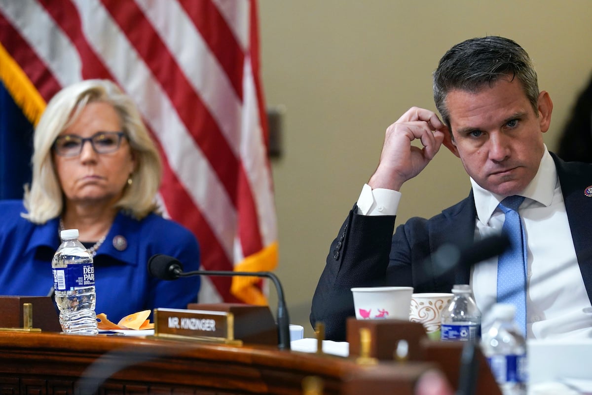 Rep. Liz Cheney, R-Wyo., and Rep. Adam Kinzinger, R-Ill., listen during a committee hearing.