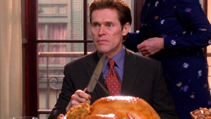Willem Dafoe as Norman Osborn carving a turkey