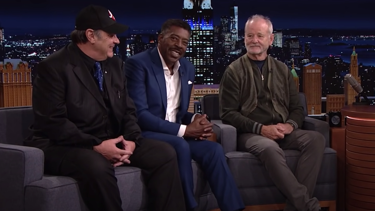 Bill Murray, Ernie Hudson, and Dan Aykroyd sitting on the couch at Jimmy Fallon