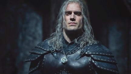 Henry Cavill poses in Geralt's new armor as Geralt of Rivia in season 2 of 'The Witcher'