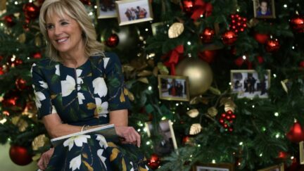 U.S. first lady Jill Biden smiles after she read her book Don’t Forget, God Bless our Troops to a second-grade class from Malcolm Elementary School in Waldorf, Maryland, in the State Dining Room of the White House November 29, 2021 in Washington, DC. First lady Jill Biden unveiled the 2021 White House holiday décor today with the theme “Gifts from the Heart”. A variety of interactive viewing experiences will be launched on digital platforms.