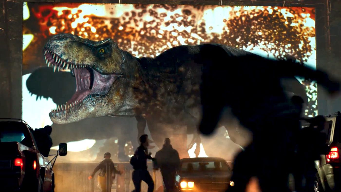 a t-rex destroying a drive in in jurassic world dominion