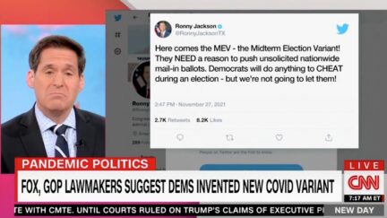 A CNN host next to an image of a tweet above a chyron about a COVID conspiracy theory