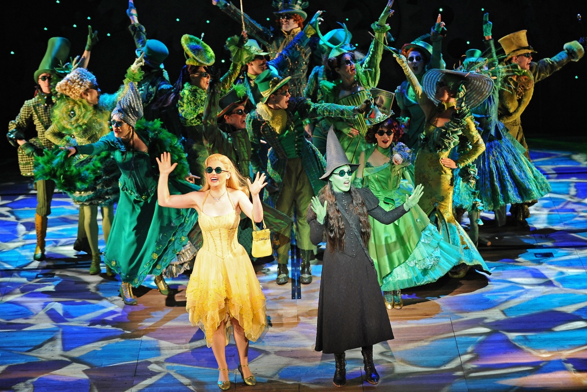 Glinda (C-L), played by Lucy Durack, and Elphaba (C-R), played by Amanda Harrison, perform in the highly acclaimed Broadway musical 'Wicked' during the preview in Sydney on September 10, 2009. 'Wicked', seen by over 20 million people worldwide, will open in Sydney on September 12. AFP PHOTO/Torsten BLACKWOOD (Photo credit should read TORSTEN BLACKWOOD/AFP via Getty Images)