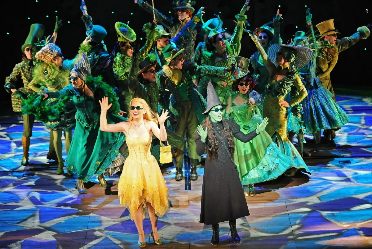 Glinda (C-L), played by Lucy Durack, and Elphaba (C-R), played by Amanda Harrison, perform in the highly acclaimed Broadway musical 'Wicked' during the preview in Sydney on September 10, 2009. 'Wicked', seen by over 20 million people worldwide, will open in Sydney on September 12. AFP PHOTO/Torsten BLACKWOOD (Photo credit should read TORSTEN BLACKWOOD/AFP via Getty Images)