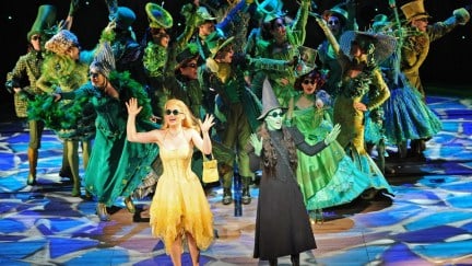 Glinda (C-L), played by Lucy Durack, and Elphaba (C-R), played by Amanda Harrison, perform in the highly acclaimed Broadway musical 'Wicked' during the preview in Sydney on September 10, 2009. 'Wicked', seen by over 20 million people worldwide, will open in Sydney on September 12. AFP PHOTO/Torsten BLACKWOOD (Photo credit should read TORSTEN BLACKWOOD/AFP via Getty Images)