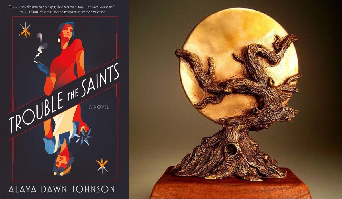 Best Novel winner next to the statue for WFA winners. (Image: Tor Books and World Fantasy Awards Administration.)
