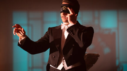 Bradley Cooper with a mask on his eyes in Nightmare Alley