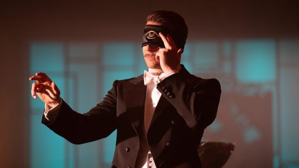 Bradley Cooper with a mask on his eyes in Nightmare Alley