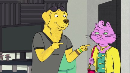 Mr. Peanutbutter smiles and points his fingers at Princess Carolyn, frowning, in a scene from Bojack Horseman