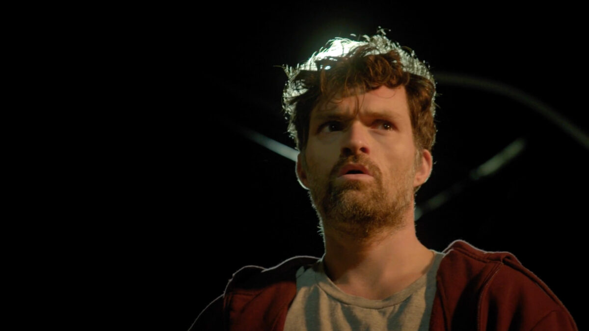 Josh Ruben as Adam looking scared in Are You Happy Now?