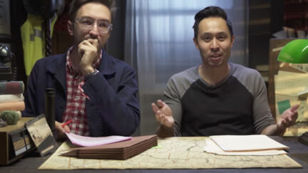 Ryan Bergara and Shane Madej at the desk in Buzzfeed Unsolved