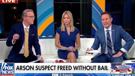 The hosts of Fox & Friends talk above a chyron reading 
