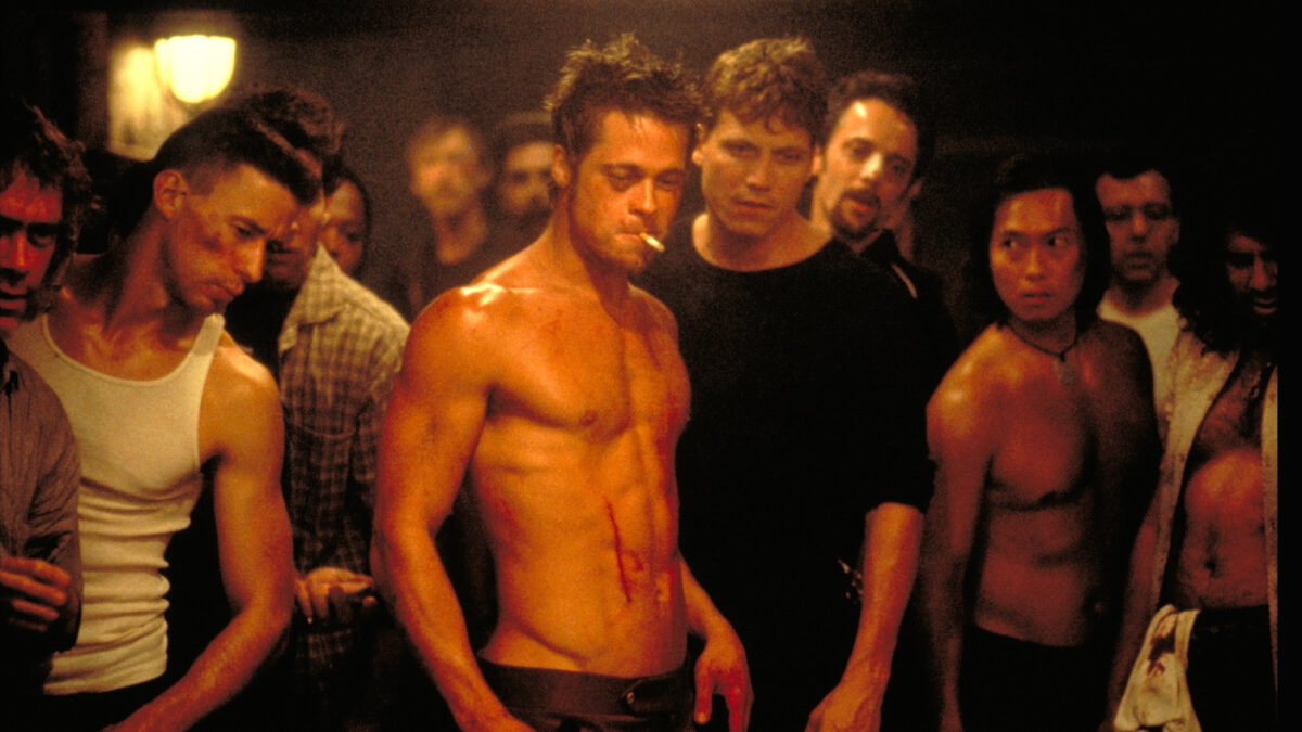 Brad Pitt poses in a fight circle in Fight Club.