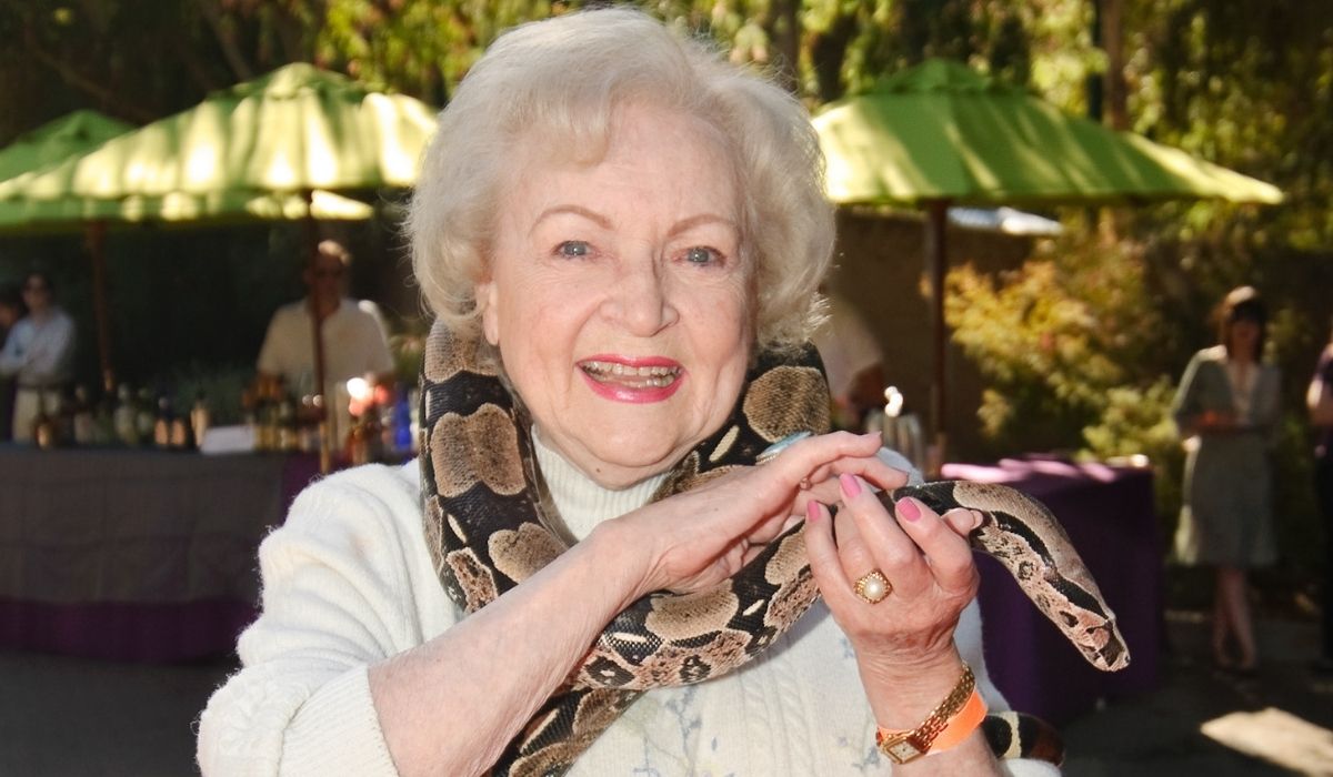 Betty White with big snake. (Image: Greater Los Angeles Zoo Association.)