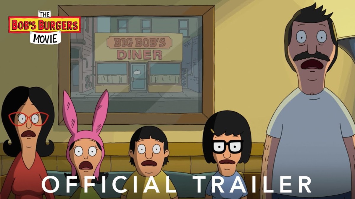 The Belcher family stands in their living room looking ahead with shocked expressions, a caption reads "official trailer"