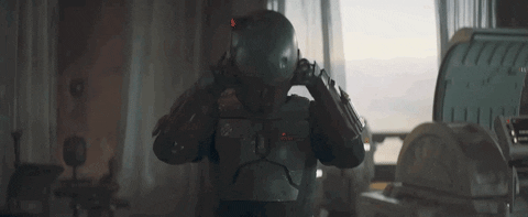 boba fett putting on his helmet