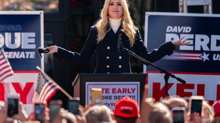 Ivanka Trump holds her arms out in a wide shrug during a campaign rally for David Perdue.