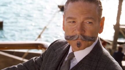 Kenneth Branagh poses as detective Hercule Poirot in front of the river in 'Death on the Nile'