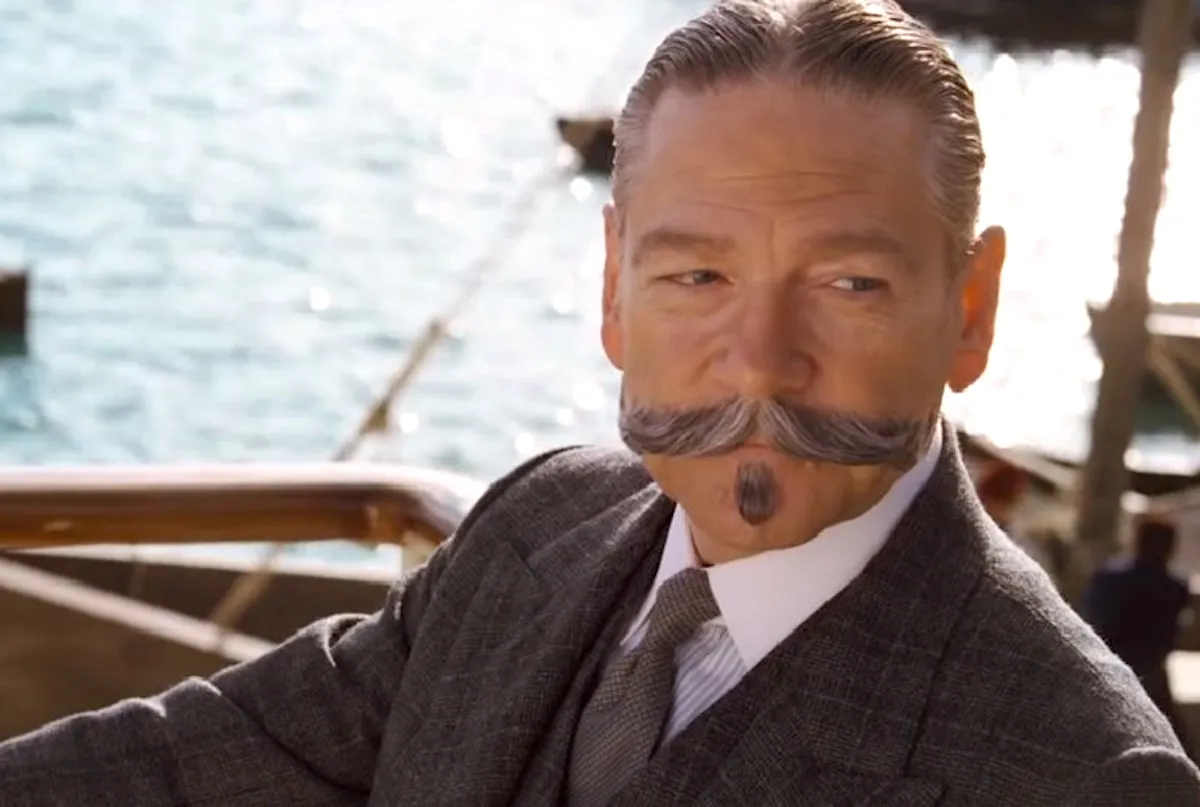 Kenneth Branagh poses as detective Hercule Poirot in front of the river in 'Death on the Nile'