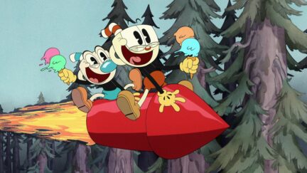 Cuphead and Mugman ride a rocket.