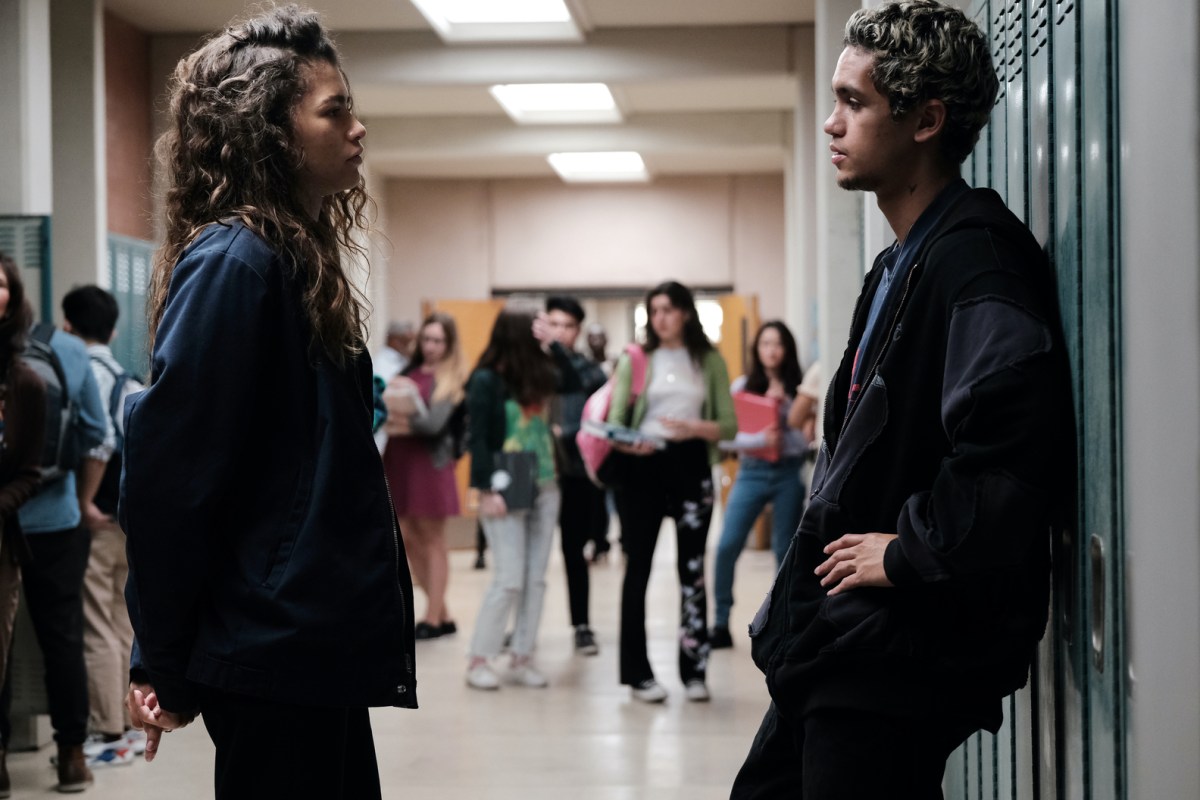 Rue and Elliot standing in the hallway in Euphoria
