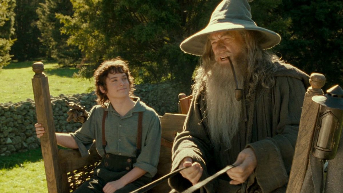 Elijah Wood and Sir Ian McKellen, as Frodo Baggins and Gandalf the Grey, ride through Hobbiton in The Lord of the Rings: The Fellowship of the Ring