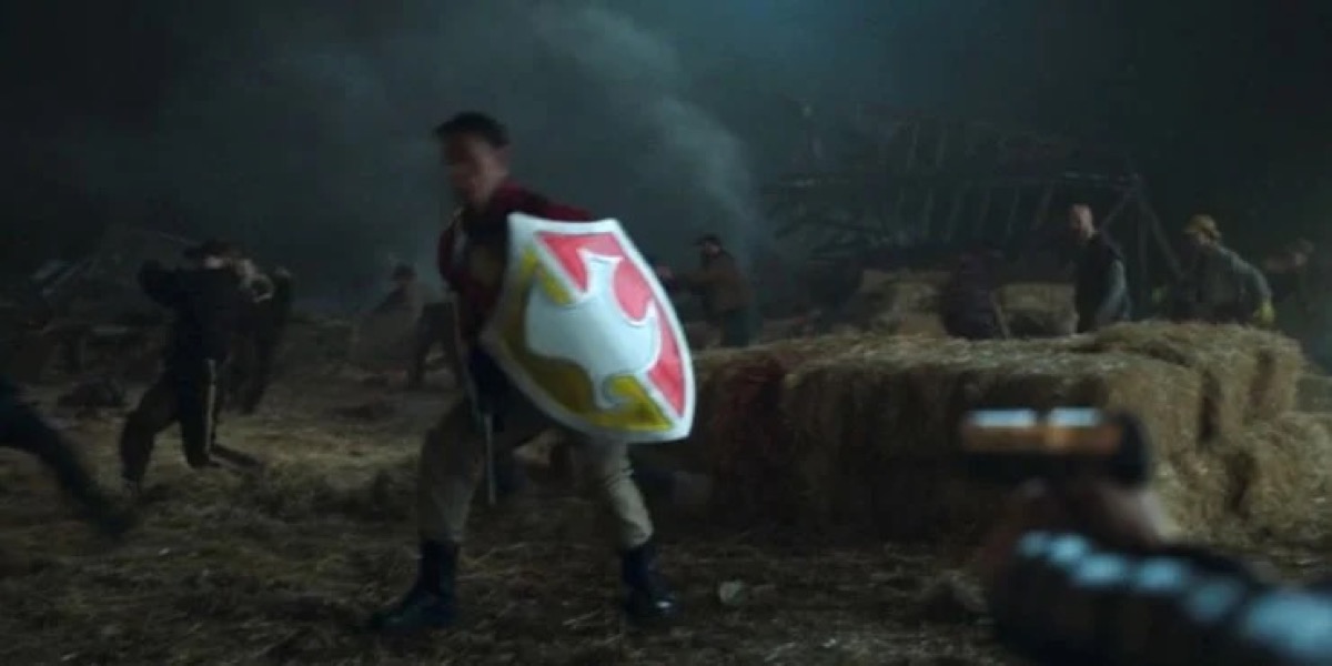 Peacemaker holding his shield in HBO Max's Peacemaker.