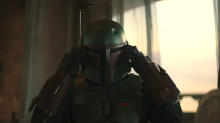 Boba Fett puts on his helmet in The Book of Boba Fett.