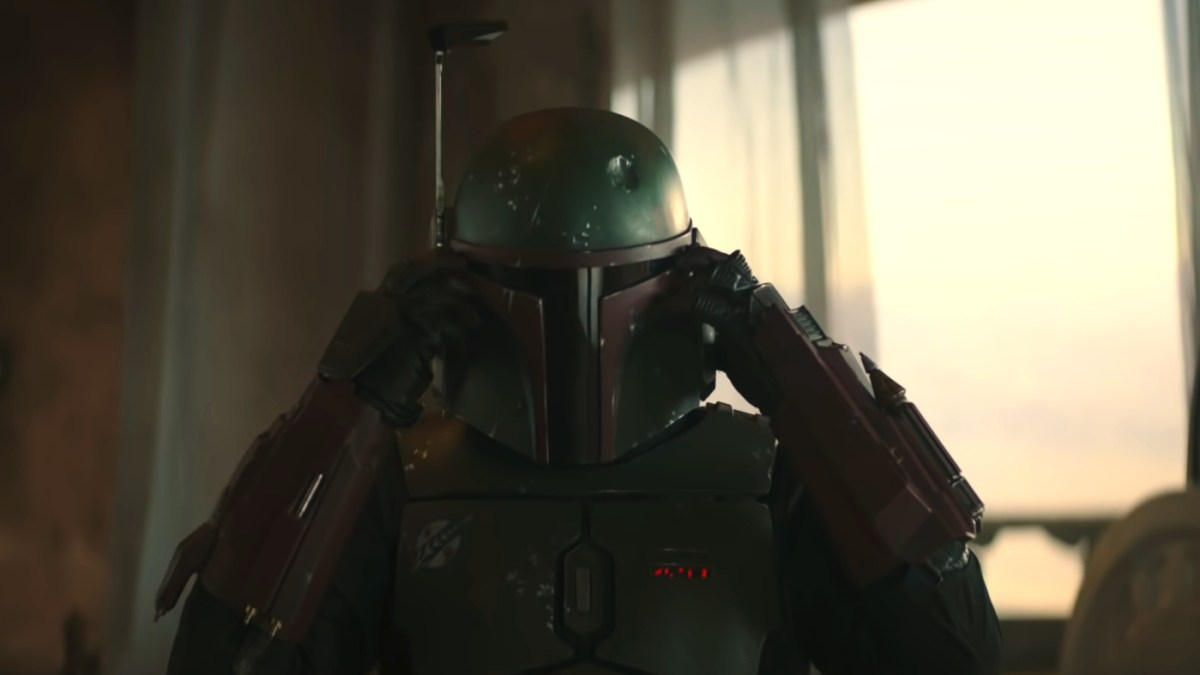 Boba Fett puts on his helmet in The Book of Boba Fett.