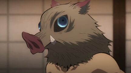 Screenshot of Inosuke running through an okiya