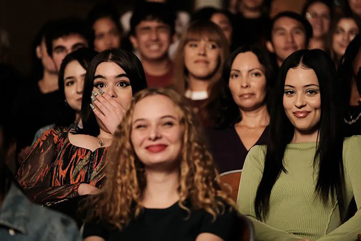 maddy and kat in the audience for lexi's play in euphoria