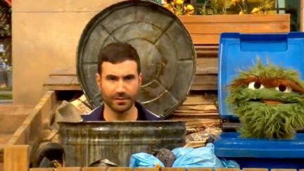 Roy Kent in a trashcan with Oscar the Grouch as it should be