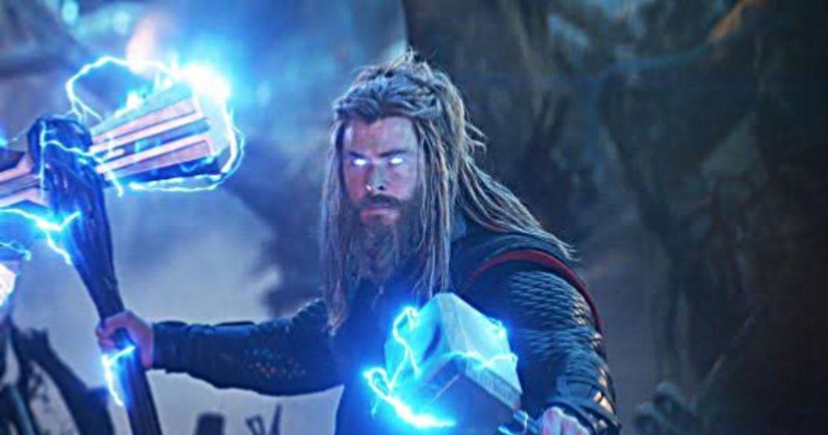 Thor holding Stormbreaker, surrounded by lightning.