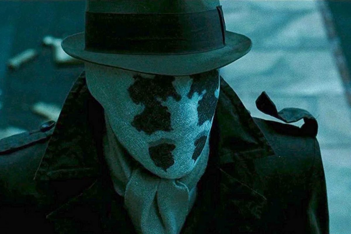 Rorschach looking on in Watchmen