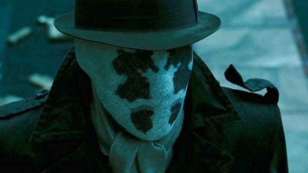Rorschach looking on in Watchmen